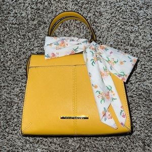 Steve Madden Breese Crossbody Handbag with scarf attached.